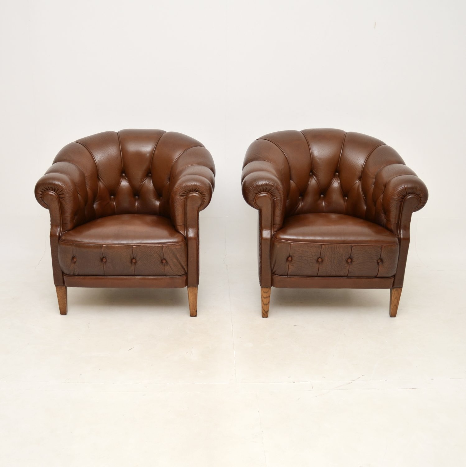 Pair of Antique Swedish Leather Club Armchairs